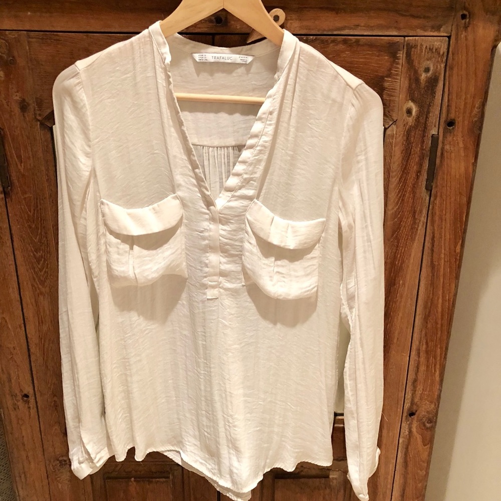 Off-white silky blouse with pockets